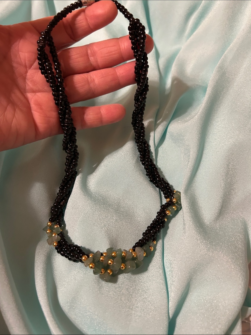 Hand Crafted Black Beaded Necklace with Green and Gold Accents